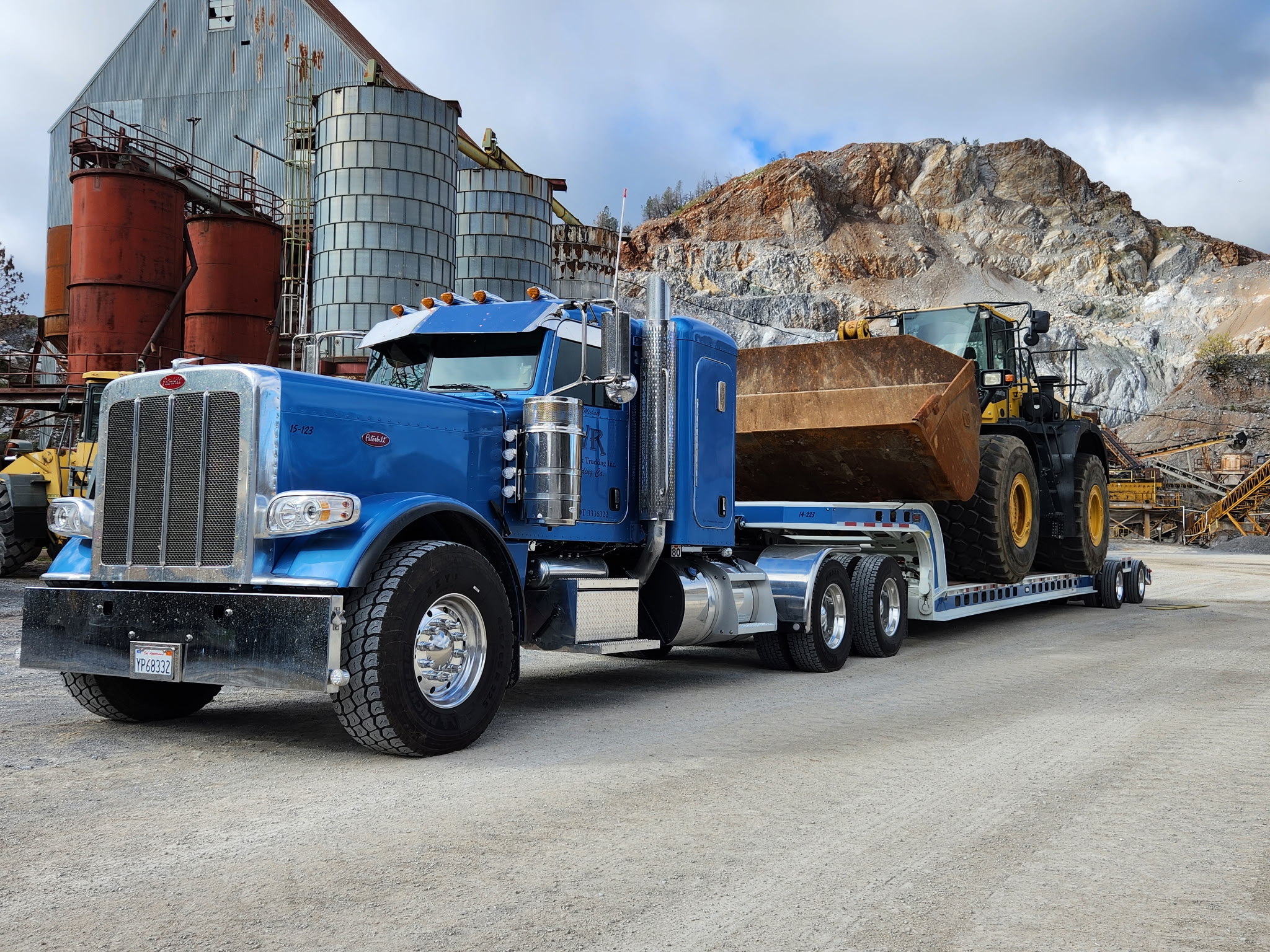Semi Truck hauling heavy equipment
