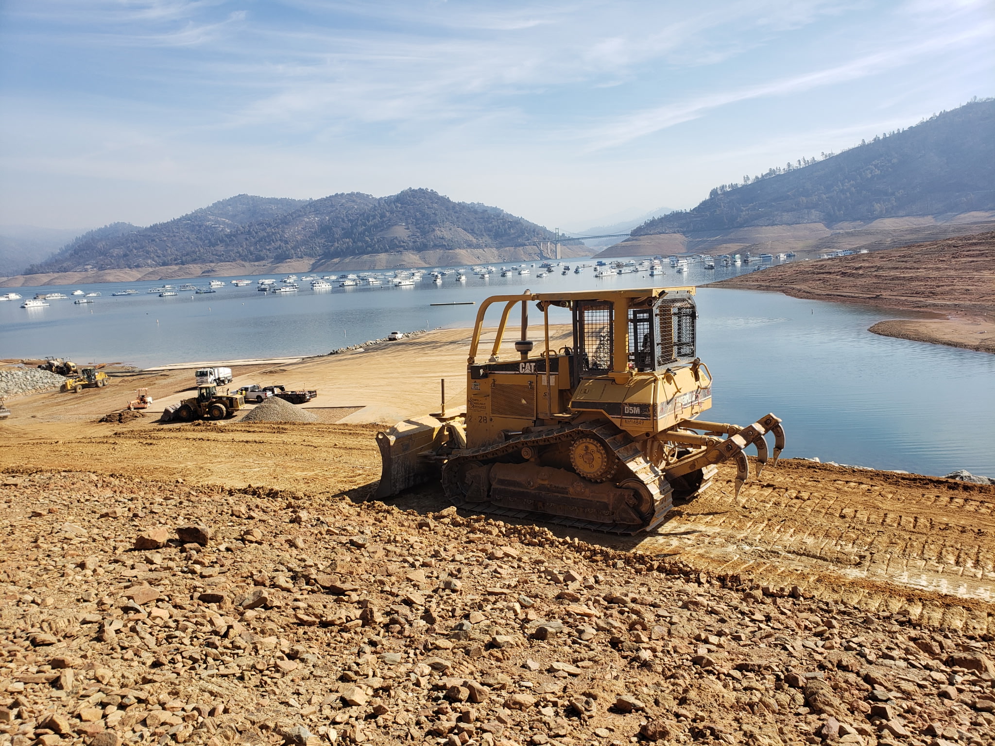 Skid steer on shasta lake.